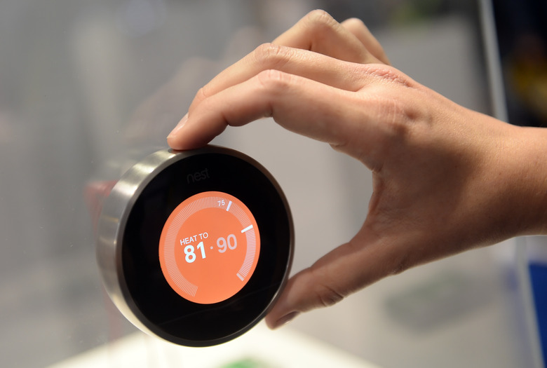 A thermostat from 'Nest' at CES (Consumer Electronics Show) in Las Vegas, Nevada, USA, 08 January 2015. The trade show takes place from 06 to 09 January 2015. Photo: BRITTA PEDERSEN/dpa | usage worldwide   (Photo by Britta Pedersen/picture alliance via Getty Images)