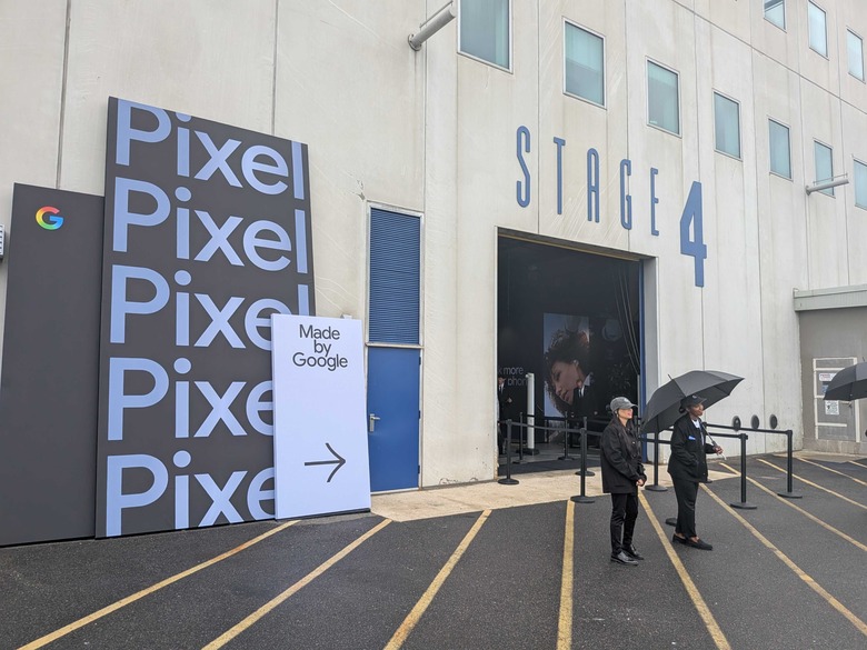 The external of a building on a rainy day, with signage for 