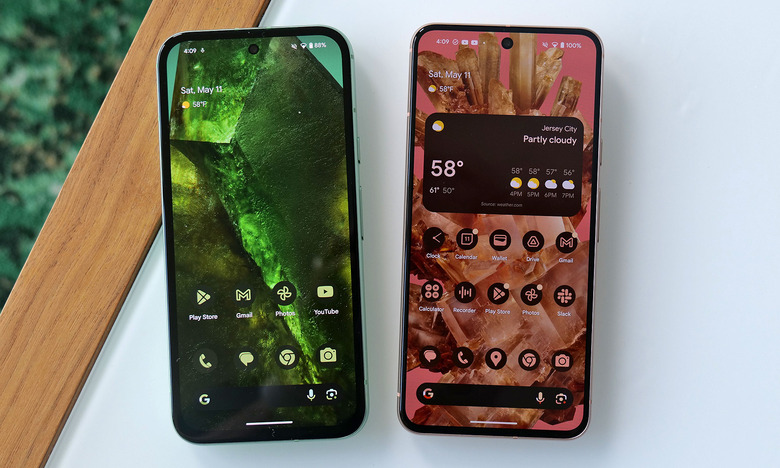 While both sport very similar designs, the Pixel 8a (left) has a slightly smaller 6.1-inch screen with larger bezels than the standard Pixel 8 (right).