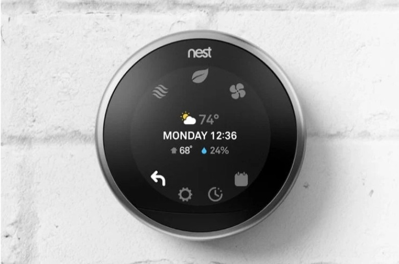 Google Nest Learning Thermostat (third-generation), showing the temperature and time of day on the display.