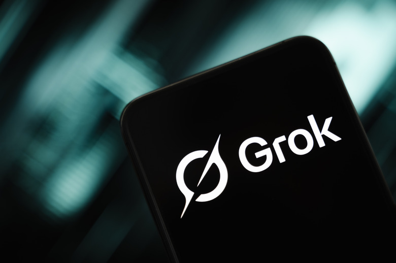 This photograph shows a smartphone screen displaying the logo of Grok, a generative chatbot based on artificial intelligence developed by the American company xAI, against a bright green and black background, in Creteil, France, on September 9, 2025. (Photo by Samuel Boivin/NurPhoto via Getty Images)
