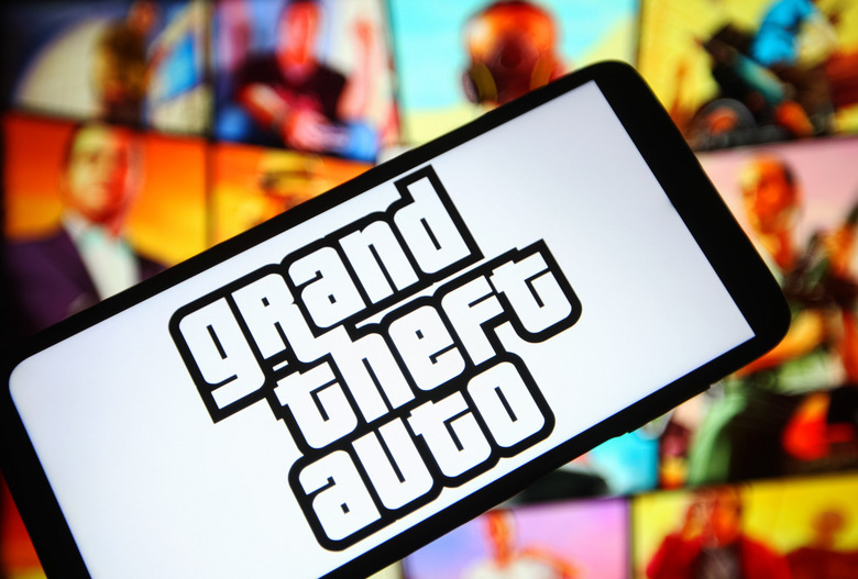 UKRAINE - 2021/10/05: In this photo illustration a Grand Theft Auto (GTA) logo of a computer game is seen on a smartphone screen. (Photo Illustration by Pavlo Gonchar/SOPA Images/LightRocket via Getty Images)