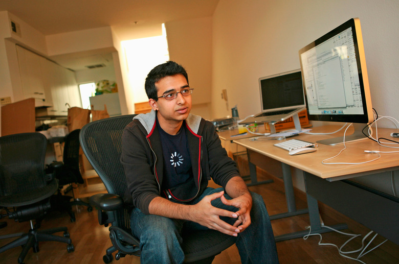 Sahil Lavingia, 19, Chief Executive Officer (CEO) of Gumroad, an online payments company he started, sits in front of computers at his home which doubles as his office in the SOMA neighborhood of San Francisco February 17, 2012. Lavingia, who was born in New York and grew up in places like London, Hong Kong and Singapore, dropped out of the University of Southern California to work at online bulletin board company Pinterest. He also developed the Turntable.fm app for the iPhone. Picture taken February 17, 2012. 
