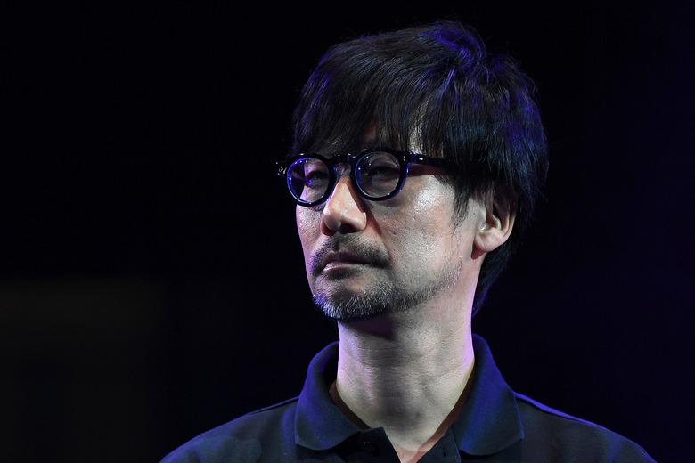 Japanese video game designer, writer, director and producer Hideo Kojima speaks on stage to present his new video game 