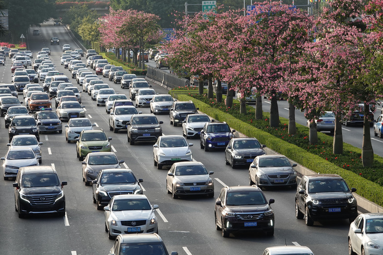 NANNING, CHINA - NOVEMBER 22: Vehicles drive on the street before the 17th China-ASEAN Expo on November 22, 2020 in Nanning, Guangxi Zhuang Autonomous Region of China. The 17th China-ASEAN Expo (CAEXPO) will be held on November 27-30 in Nanning. (Photo by Yu Xiangquan/VCG via Getty Images)