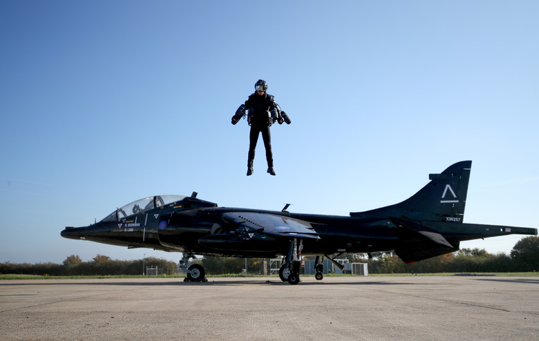 Richard Browning, Chief Test Pilot and CEO of Gravity Industries, wears a Jet Suit and flies during a demonstration flight at Bentwaters Park, Woodbridge, Britain, October 4, 2018. REUTERS/Chris Radburn           TPX IMAGES OF THE DAY