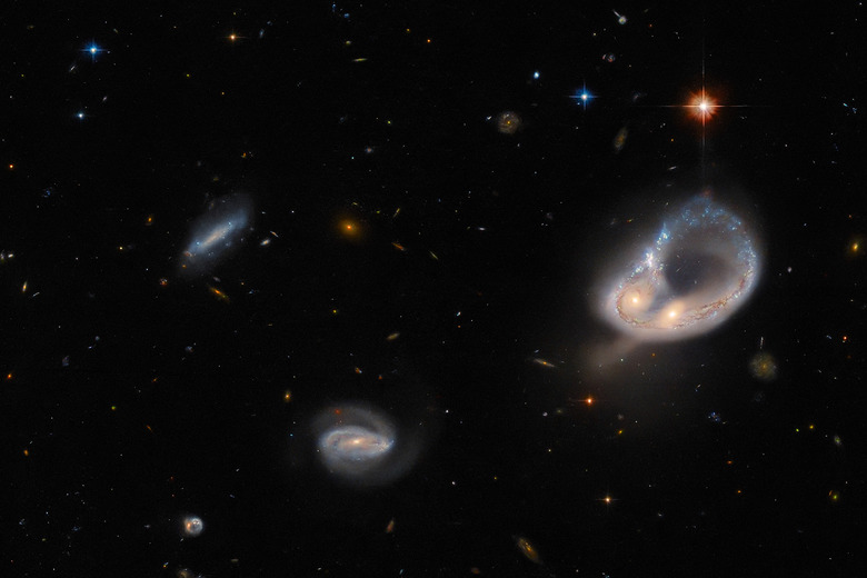 The Arp-Madore 417-391 galaxy collision in its greater context.