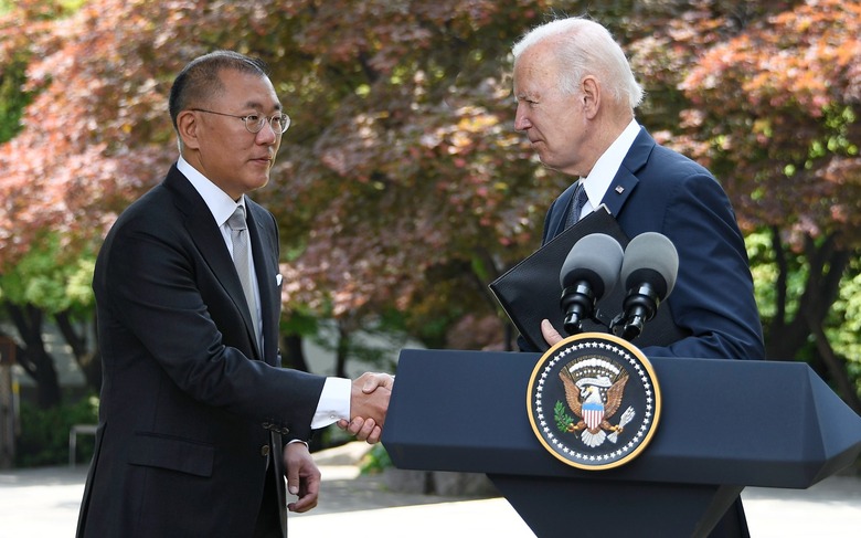 Hyundai executive chairman Euisun Chung shaking hands with US President Joe Biden. 
