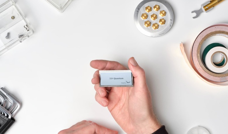 IBM's Osprey quantum computing processor, held in a person's hand.