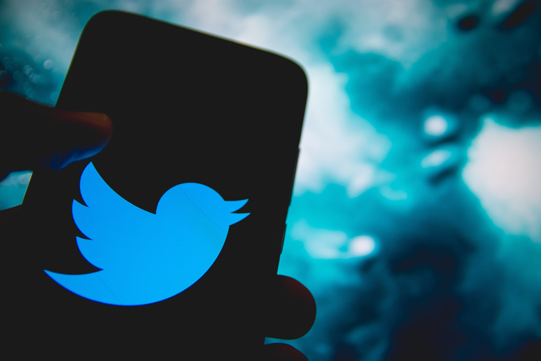 In this photo illustration Twitter logo is displayed on a smartphone screen in Athens, Greece on April 14, 2021. (Photo by Nikolas Kokovlis/NurPhoto via Getty Images)