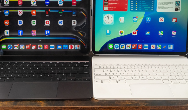 The iPad Pro M4 on the left and the iPad Air M3 on the right. The iPad Pro's keyboard has a slightly bigger trackpad.
