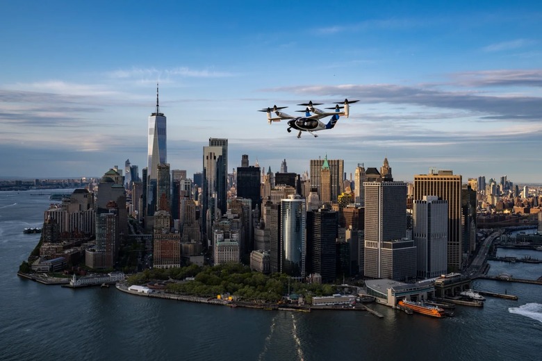 A Joby air taxi flying across the New York City skyline.