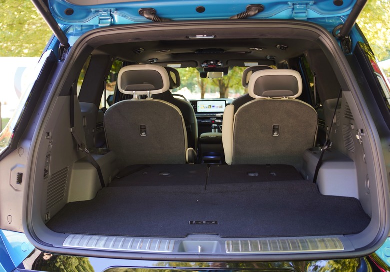 The EV9's trunk space with the third row of seats folded down.