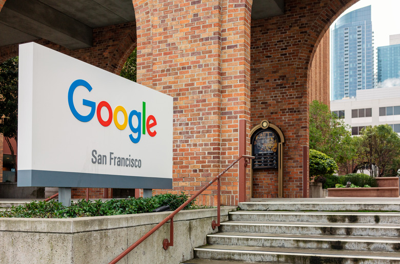 San Francisco, USA - A large sign outside Google's offices in San Francisco, with part of the city's skyline in the background.