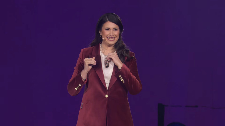 Gomez reveals that her necklace has secretly been a Qira wearable the whole time, allegedly capturing important moments from earlier in the presentation as they happened.