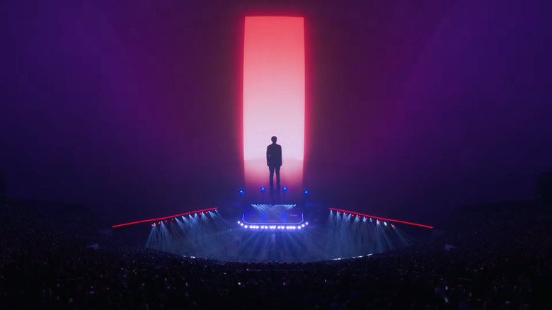 Lenovo CEO Yuanqing Yang takes the stage with a WWE-style entrance.