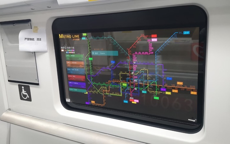 LG Display transparent OLED in a subway train.