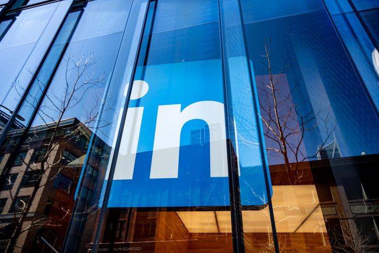 Facade of LinkedIn office building with large logo visible, reflecting surrounding cityscape, SoMa neighborhood, San Francisco, California, March 18, 2025. (Photo by Smith Collection/Gado/Getty Images)
