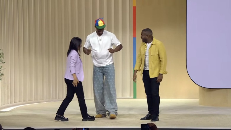 NBA star Jimmy Butler (center) helps demo the Pixel's new camera features.