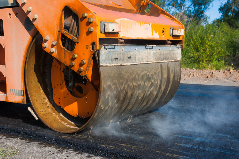 The road rollers working on the new road construction site