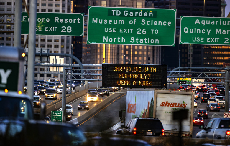 BOSTON, MA - NOVEMBER 24: Traffic on I- 93 South in Boston is stalled by South Bay in Boston on Nov. 24, 2020, two days before Thanksgiving. A sign reads 