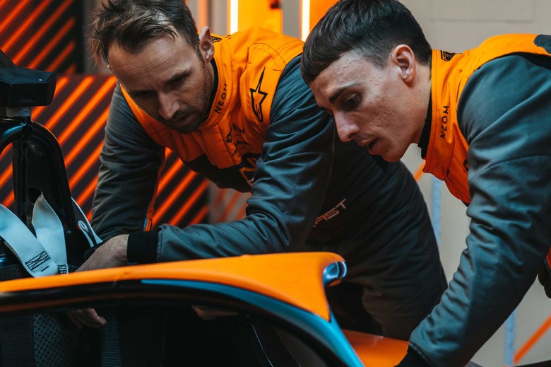 Rast and Hughes inspect the Gen3 car.