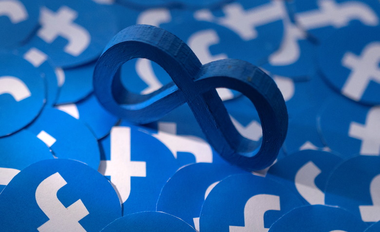 Meta and Facebook logos are seen in this illustration taken February 15, 2022. REUTERS/Dado Ruvic/Illustration