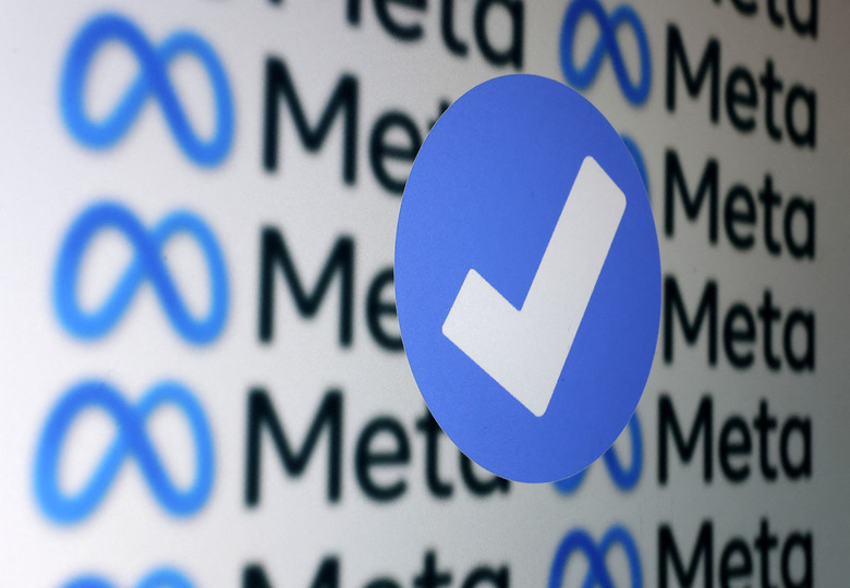 A blue verification badge and Meta logos are seen in this illustration taken January 19, 2023. REUTERS/Dado Ruvic/Illustration