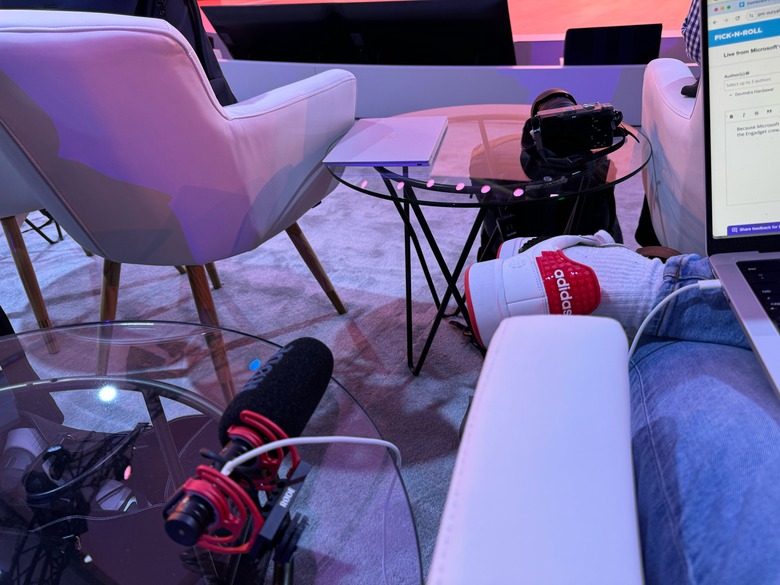 A Rode shotgun mic connected to a MacBook Pro.