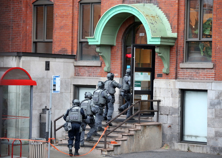 Police enter the offices of gaming software developer Ubisoft during a police security operation in Montreal, Quebec, Canada November 13, 2020.  REUTERS/Christinne Muschi