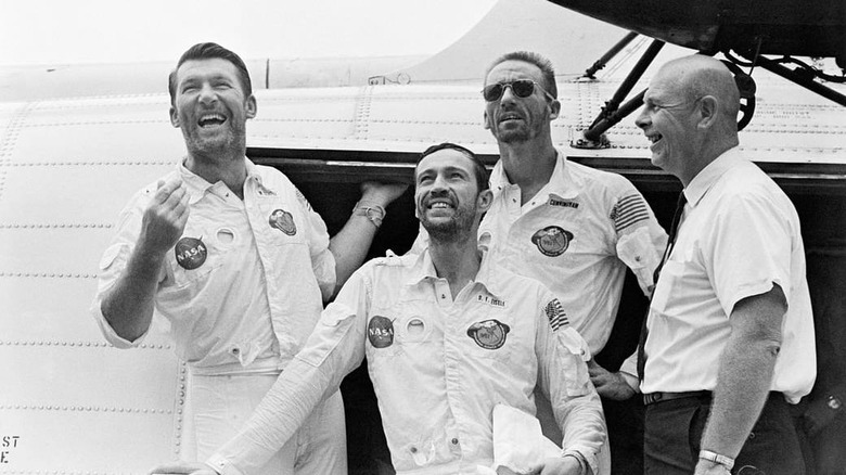 Left to right: Walter Schirra, Donn Eisele, Walter Cunningham, Dr. Donald E. Stullken