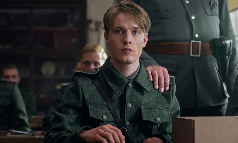 Screenscap from Netflix's upcoming World War II drama, All The Light We Cannot See. Louis Hofmann stars as German soldier Werner Pfennig.   