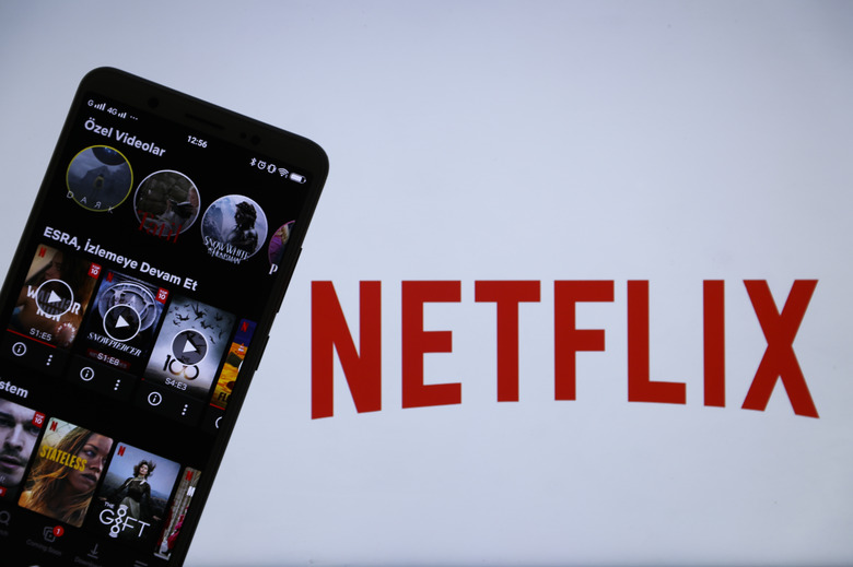 ANKARA, TURKEY - JULY 13: In this photo illustration, the logo of Netflix is displayed on a laptop screen and the application is displayed on a smart phone screen in Ankara, Turkey on July 13, 2020. (Photo by Esra Hacioglu/Anadolu Agency via Getty Images)