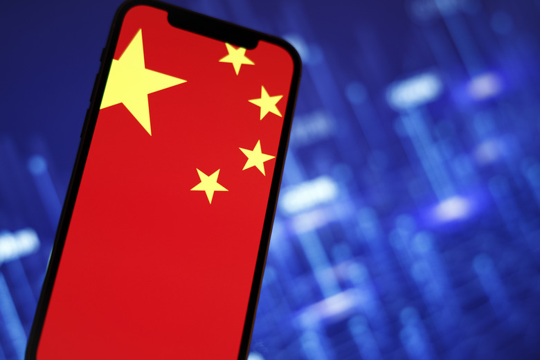 The Chinese flag is seen on a mobile phone in this photo illustration in Warsaw, Poland on 27 September, 2022. (Photo by STR/NurPhoto via Getty Images)