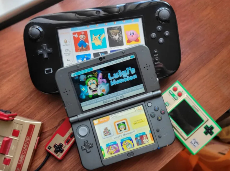 A 3DS and Wii U on a table.