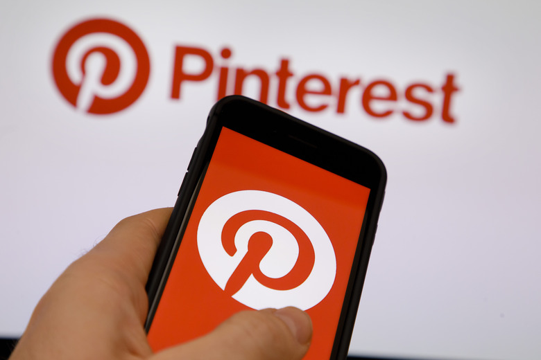 BERLIN, GERMANY - OCTOBER 05: The Logo of Pinterest is displayed on a smartphone on October 05, 2018 in Berlin, Germany. (Photo by Thomas Trutschel/Photothek via Getty Images)