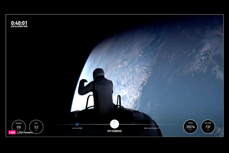 An astronaut in space with the Earth in the background.