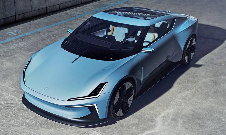 The Polestar O2 EV in ice blue seen from a high angle parked on a raw concrete surface.