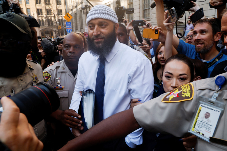 Adnan Syed, whose case was chronicled in the hit podcast “Serial,” leaves the courthouse after a judge overturned Syed's 2000 murder conviction and ordered a new trial during a hearing at the Baltimore City Circuit Courthouse in Baltimore, Maryland U.S., September 19, 2022. REUTERS/Jonathan Ernst