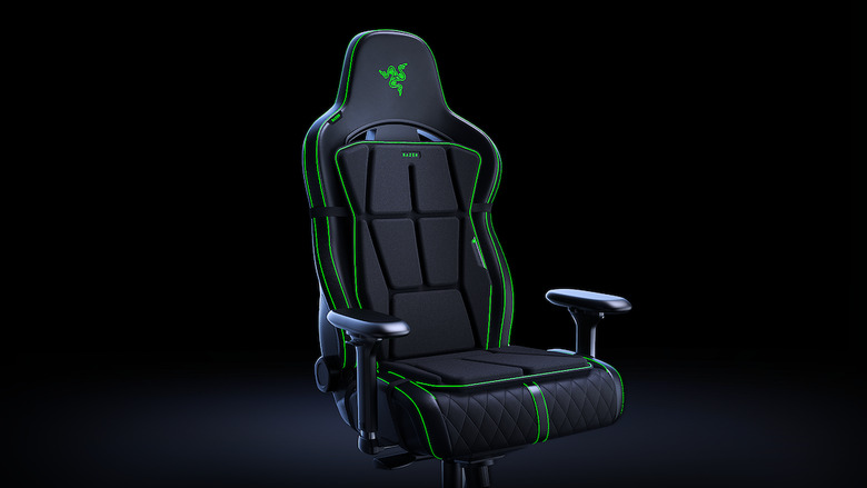 A green and black gaming chair. 