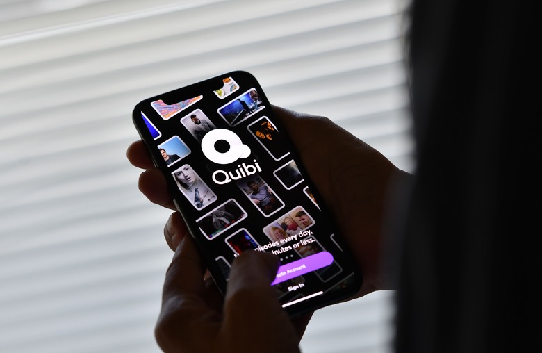 This illustration photo shows a person about to use the Quibi app on a smart phone in Los Angeles, October 21, 2020. - Quibi, the short video streaming service launched in April in North America by Jeffrey Katzenberg, a former Disney boss, announced on October 21 the closure and resale of its catalog and other assets because of the pandemic but also because of its business model. (Photo by Chris DELMAS / AFP) (Photo by CHRIS DELMAS/AFP via Getty Images)