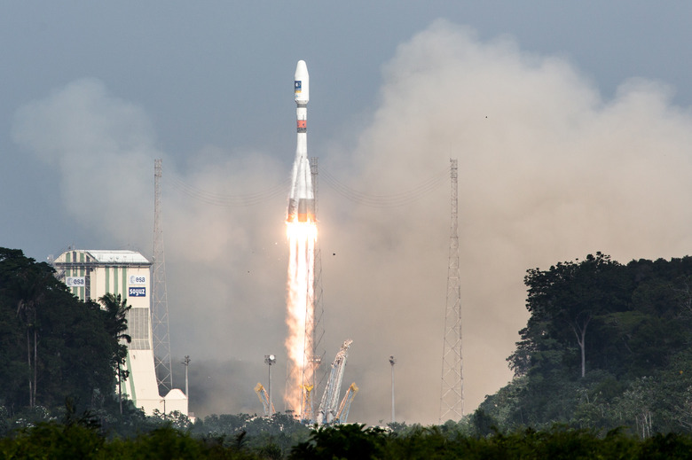 A picture taken on December 17, 2015 shows a Soyuz rocket blasting off from the European space centre at Kourou, French Guiana.

Europe was set to launch the next two satellites today for its multi-billion-euro Galileo satnav system, a rival to America's GPS, according to space firm Arianespace. / AFP / Jody AMIET        (Photo credit should read JODY AMIET/AFP via Getty Images)