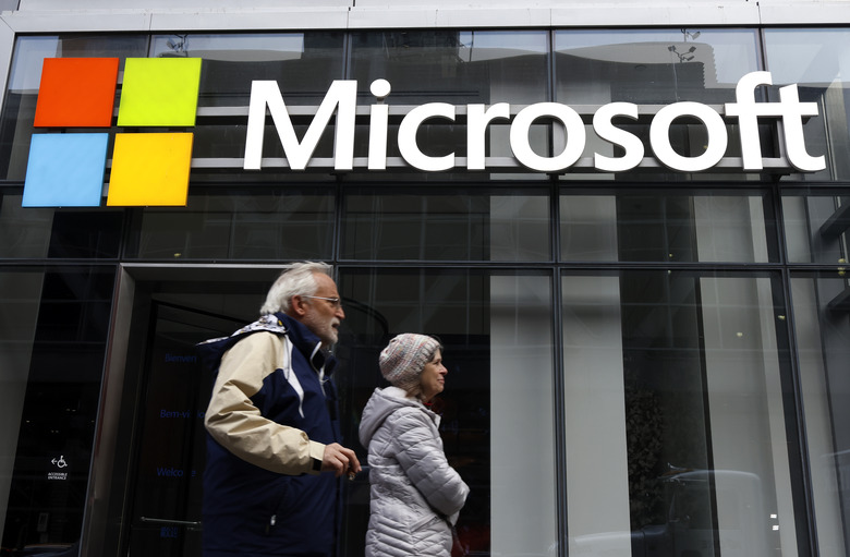NEW YORK, NY - DECEMBER 30: The corporate logo for Microsoft is displayed on the front of their building on 8th Avenue on December 30, 2023, in New York City. (Photo by Gary Hershorn/Getty Images)