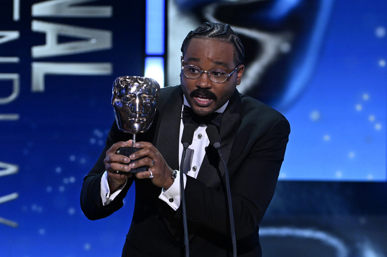 LONDON, ENGLAND - FEBRUARY 22: Ryan Coogler accepts the Original Screenplay Award for 'Sinners' on stage during the EE BAFTA Film Awards 2026 at The Royal Festival Hall on February 22, 2026 in London, England. (Photo by Stuart Wilson/BAFTA/Getty Images for BAFTA)