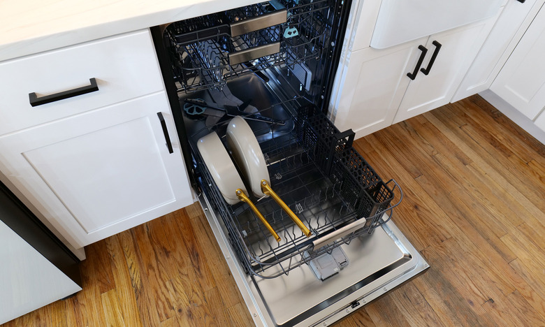 Samsung's Bespoke Auto Open Door Dishwasher has a dedicated pan holder and sprayers on its third-rack for glasses. 