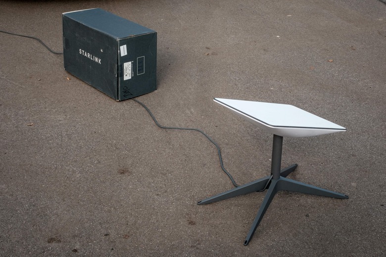 A Starlink satellite-based broadband system is seen at a mobile passport application station installed by the State Migration Service in Shevchenk, Kharkiv region, on September 29, 2022. (Photo by Yasuyoshi CHIBA / AFP) (Photo by YASUYOSHI CHIBA/AFP via Getty Images)