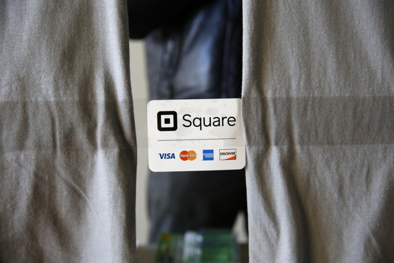 An advertisement for the Square Inc payment processor is seen outside a vendors site along the High Line in New York March 9, 2016. REUTERS/Shannon Stapleton
