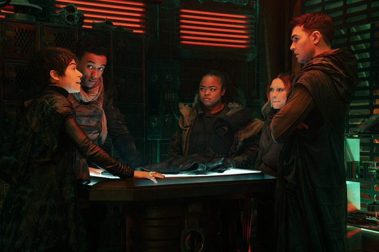 L-R: Tatiana Maslany as Anisha, Sandro Rosta as Caleb, Kerrice Brooks as SAM, Bella Shepard as Genesis, and George Hawkins as Darem in season 1, episode 9, of Star Trek: Starfleet Academy streaming on Paramount+.