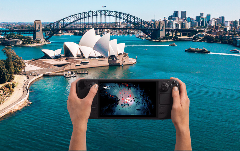 Hands holding a console with the Sydney Opera House in the background.