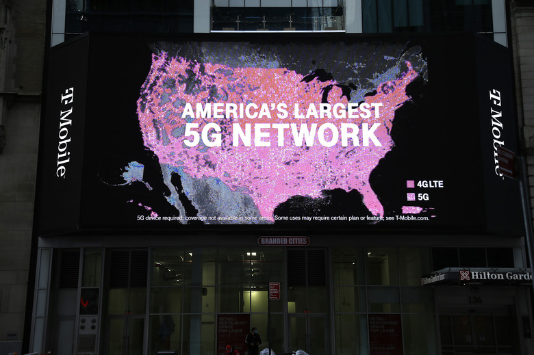 T-Mobile network advertises seen on a Jumbotron in Times...